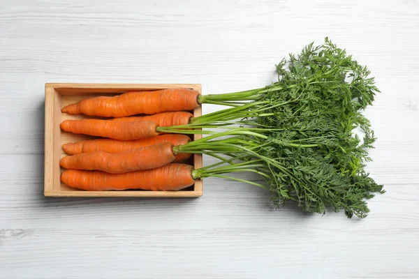 Fresh Carrots Crate White Wooden Table Top View — Stok Foto