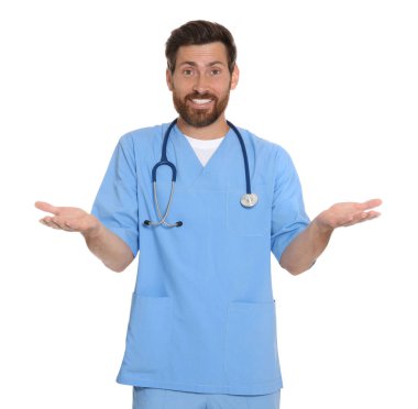 Portrait of doctor in scrubs on white background