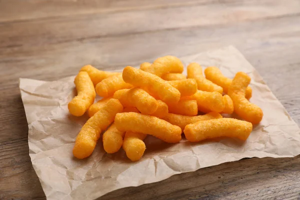 Many Tasty Cheesy Corn Puffs Wooden Table — Stock Photo, Image