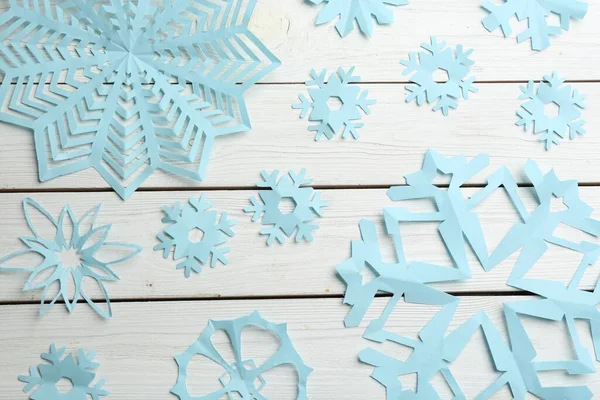 Many Paper Snowflakes White Wooden Background Flat Lay — 图库照片