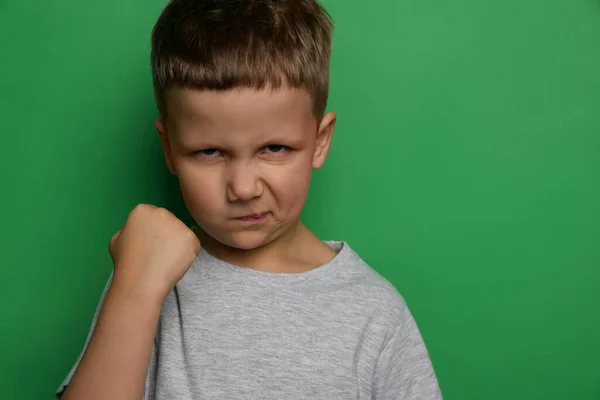 Angry Little Boy Green Background Space Text Aggressive Behavior — Fotografia de Stock