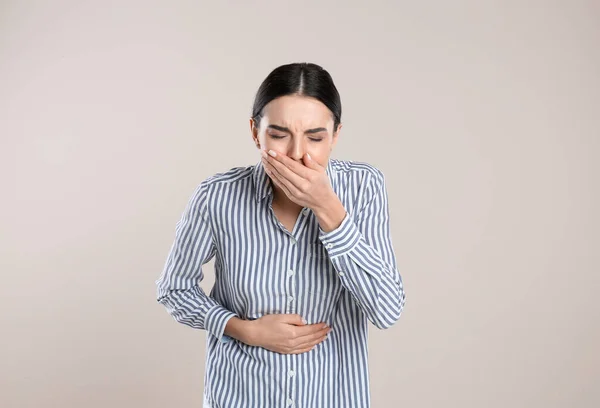 Woman Suffering Stomach Ache Nausea Beige Background Food Poisoning — Photo