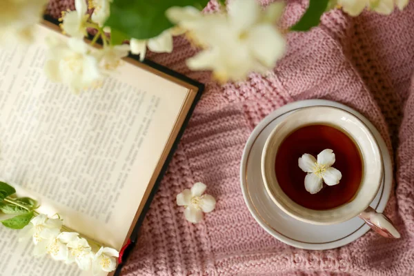 Open Book Cup Aromatic Tea Beautiful Jasmine Flowers Pink Fabric — Stock Photo, Image