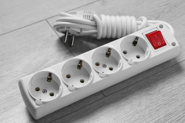 Power Strip Wooden Floor Closeup Electrician Equipment — 图库照片