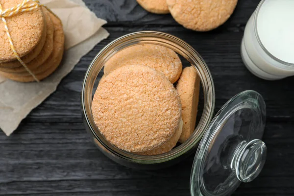 Delicious Sugar Cookies Glass Milk Black Wooden Table Flat Lay — Stock Photo, Image