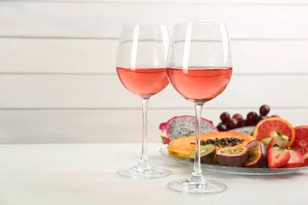 Delicious Exotic Fruits Wine White Wooden Table Space Text — 스톡 사진