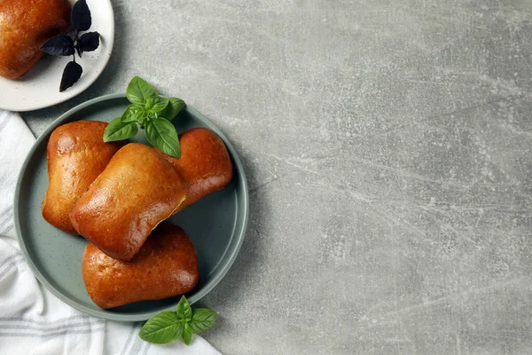 Delicious Baked Pirozhki Basil Light Grey Table Flat Lay Space — 스톡 사진