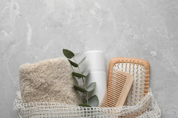 Dry Shampoo Spray Towel Hairbrushes Eucalyptus Branch Light Grey Table — Stock Photo, Image