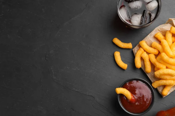 Crunchy Cheesy Corn Snack Ketchup Cola Black Table Flat Lay — 图库照片
