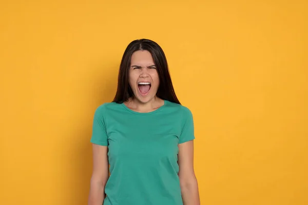 Aggressive Young Woman Shouting Orange Background — Φωτογραφία Αρχείου