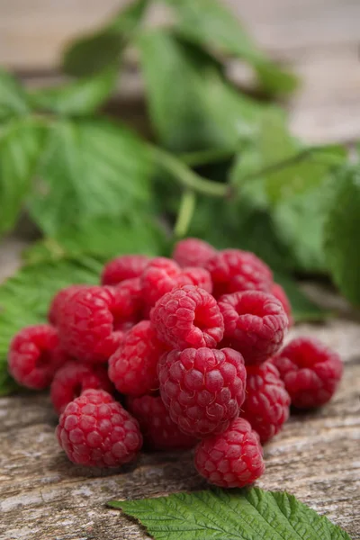 Fresh Ripe Raspberries Green Leaves Wooden Table Closeup — Stockfoto