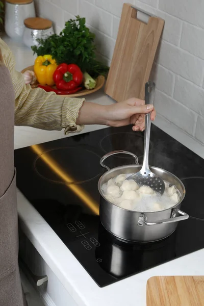 Woman Cooking Dumplings Saucepan Boiling Water Cooktop Closeup — Foto de Stock