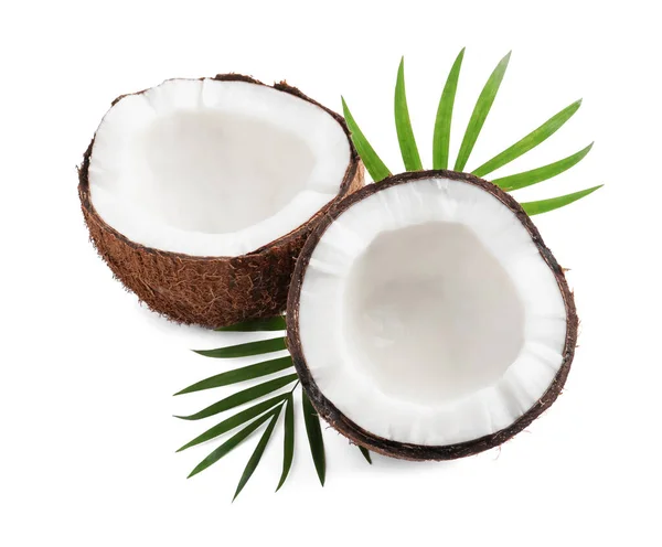 Halves Fresh Ripe Coconut Green Leaves White Background — Stockfoto