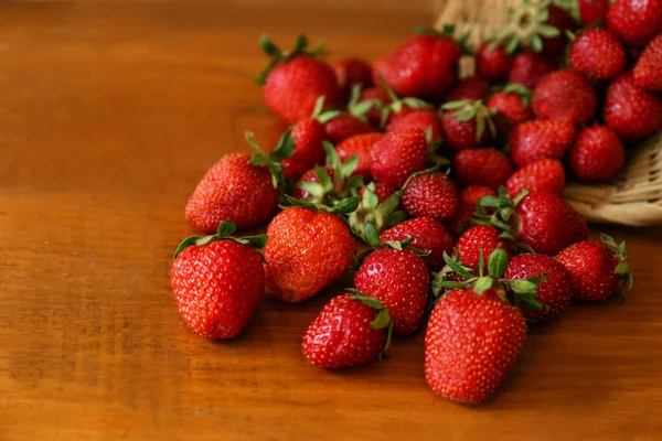 Basket Scattered Ripe Strawberries Wooden Table Closeup — Foto de Stock