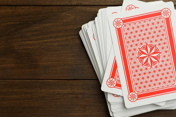Deck Playing Cards Wooden Table Top View Space Text — Stockfoto