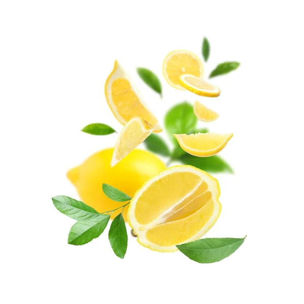Fresh Ripe Lemons Green Leaves Falling White Background — Foto de Stock