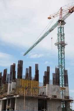View of construction site with modern tower crane