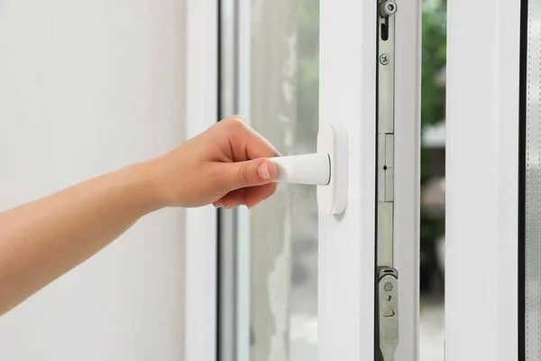 Woman Opening White Plastic Window Home Closeup — стоковое фото