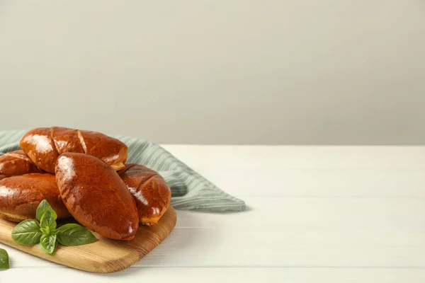 Delicious Baked Pirozhki Basil White Wooden Table Space Text — Stok fotoğraf