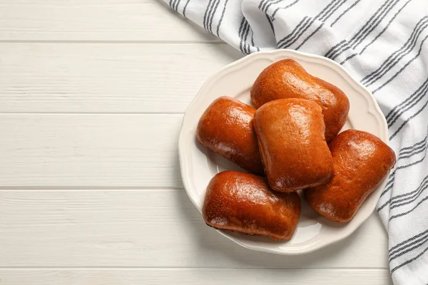 Delicious Baked Pirozhki White Wooden Table Top View Space Text — Stockfoto