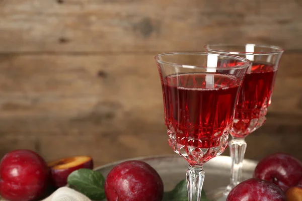 Delicious Plum Liquor Ripe Fruits Wooden Background Homemade Strong Alcoholic — 图库照片