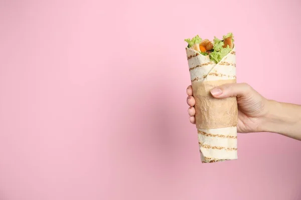 Woman Holding Delicious Chicken Shawarma Pink Background Closeup Space Text — Stock Fotó