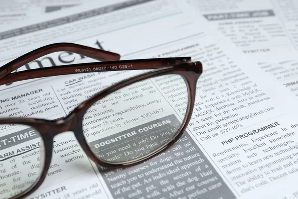 Glasses Newspaper Closeup View Search Concept —  Fotos de Stock