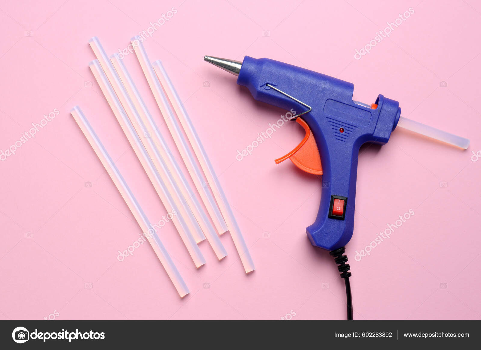Blue Glue Gun Sticks Pink Background Flat Lay Stock Photo by ©NewAfrica  602283892