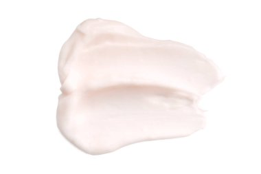 Sample of face cream on white background, top view