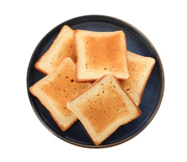 Plate with slices of delicious toasted bread on white background, top view