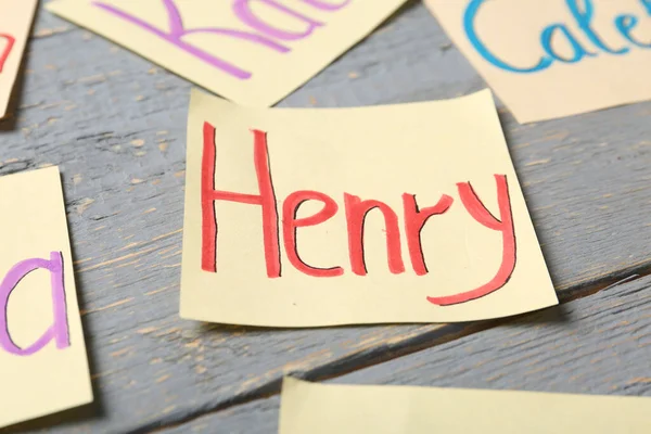 Paper Sheet Baby Name Henry Grey Wooden Table Closeup — Photo