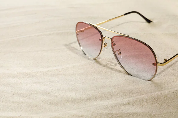 Stylish Sunglasses Sand Closeup Space Text — Stockfoto
