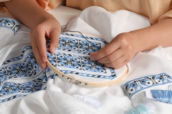 Woman Embroidering Shirt Blue Thread Table Closeup Ukrainian National Clothes — Stock Photo, Image