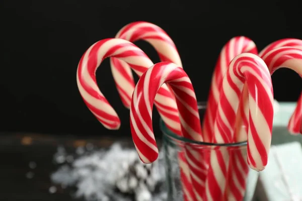 Many Sweet Candy Canes Glass Black Background Closeup Traditional Christmas — Stockfoto