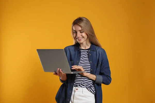 Portrait Young Woman Modern Laptop Yellow Background — Photo