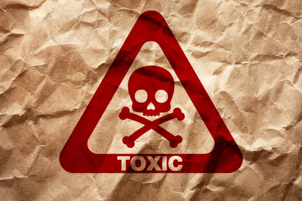 Hazard Warning Sign Skull Crossbones Symbol Word Toxic Crumpled Kraft — Fotografia de Stock