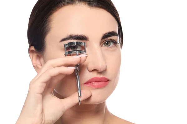 Woman Using Eyelash Curler White Background — ストック写真