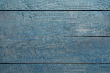 Açık mavi ahşap yüzey dokusu arka plan olarak, üst görünüm