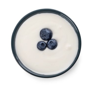 Bowl of delicious yogurt with blueberries isolated on white, top view