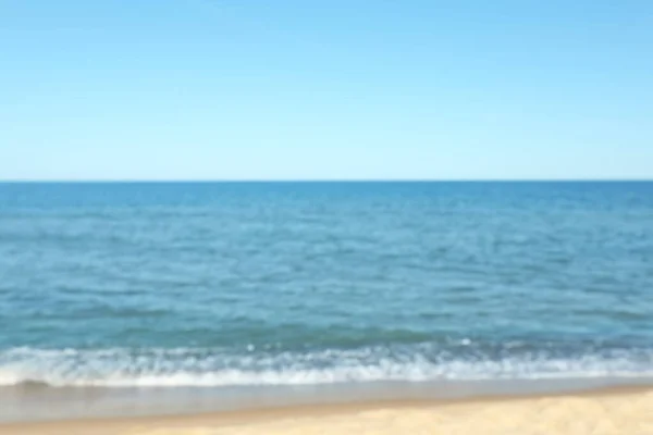 Vista Sfocata Della Spiaggia Sabbiosa Vicino Mare — Foto Stock