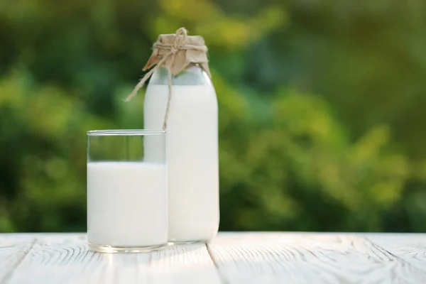 Bottle Glass Tasty Fresh Milk White Wooden Table Blurred Background — Stock Photo, Image