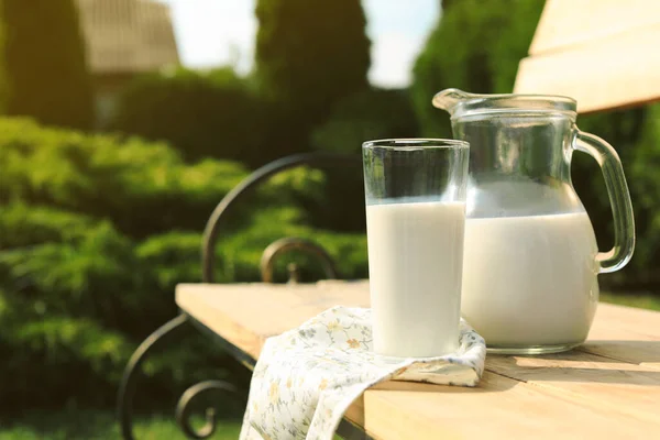 Jug Glass Tasty Fresh Milk Wooden Bench Outdoors Space Text — ストック写真