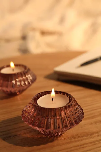 Burning Candles Beautiful Glass Holders Wooden Table Indoors — Stockfoto