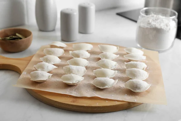 Fresh Uncooked Dumplings Flour White Table — Zdjęcie stockowe
