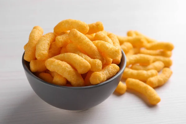 Many Tasty Cheesy Corn Puffs White Wooden Table Closeup — Stock fotografie