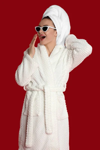 Beautiful Young Woman Bathrobe Sunglasses Yawning Red Background — 스톡 사진