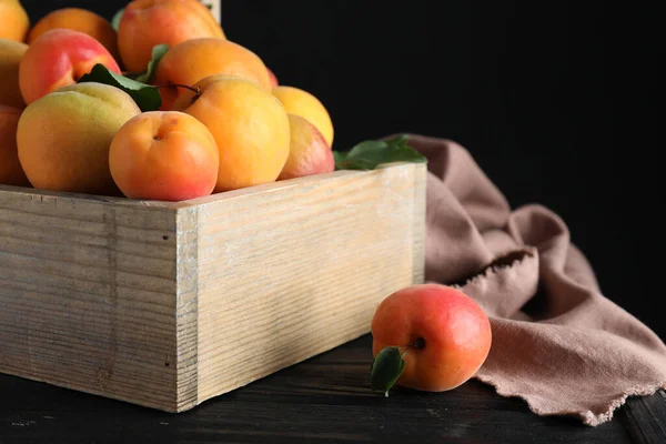 Many Fresh Ripe Apricots Wooden Table Black Background — Photo