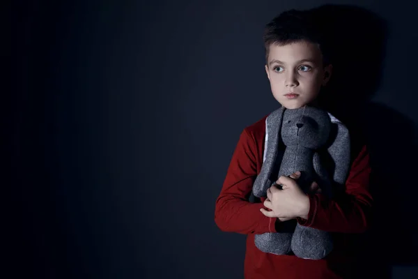 Sad Little Boy Toy Black Wall Space Text Domestic Violence — Stok fotoğraf