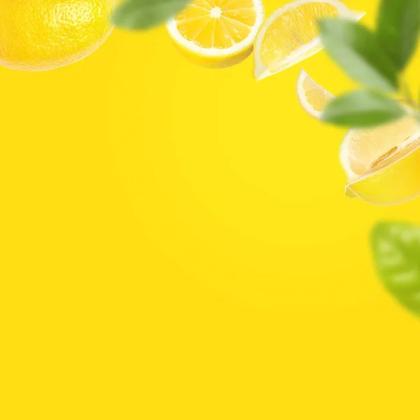 Fresh Ripe Lemons Green Leaves Yellow Background Space Text — Stockfoto