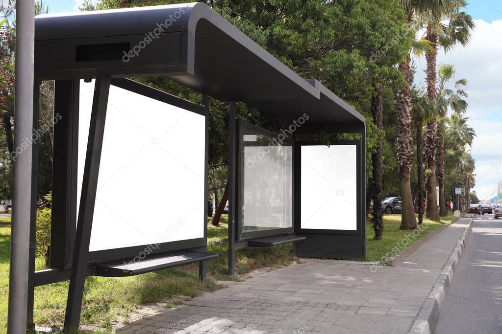 Blank advertising boards on transport stop. Space for design